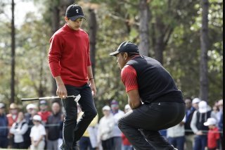 Tiger Woods et son fils Charlie feront à nouveau équipe KEYSTONE/FR170029 AP/KEVIN KOLCZYNSKI